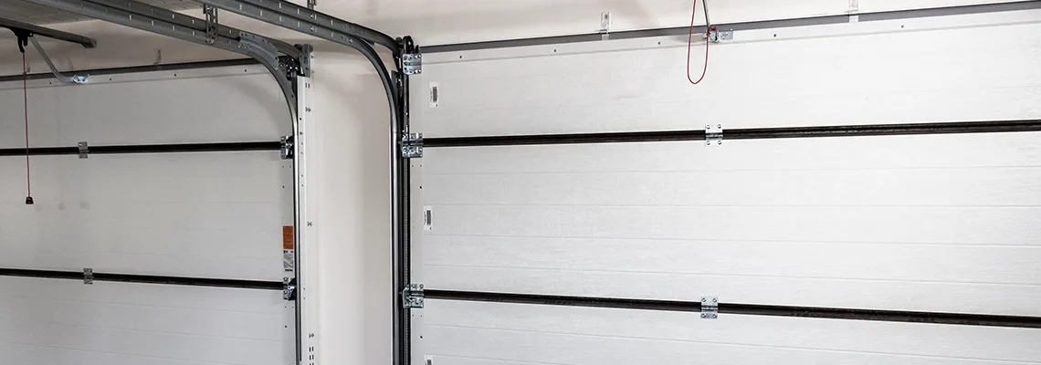 Fix Folding Garage Door Jerking in Melbourne, Florida