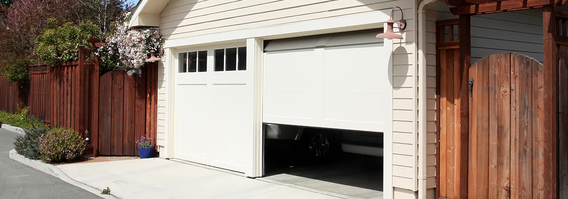 Fix Metal Garage Door Jerking in Melbourne, Florida